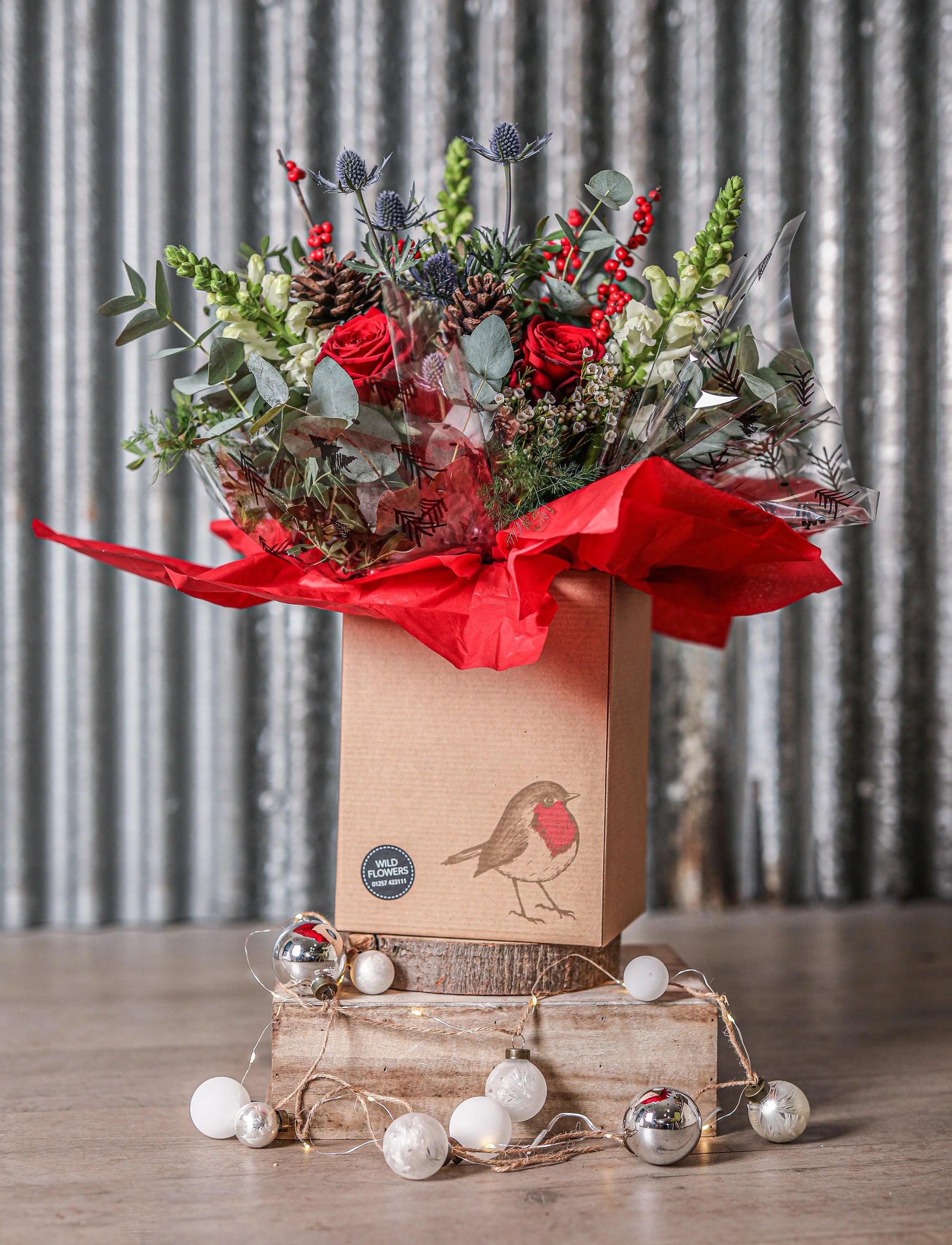 Christmas Flowers in a natural gift bag