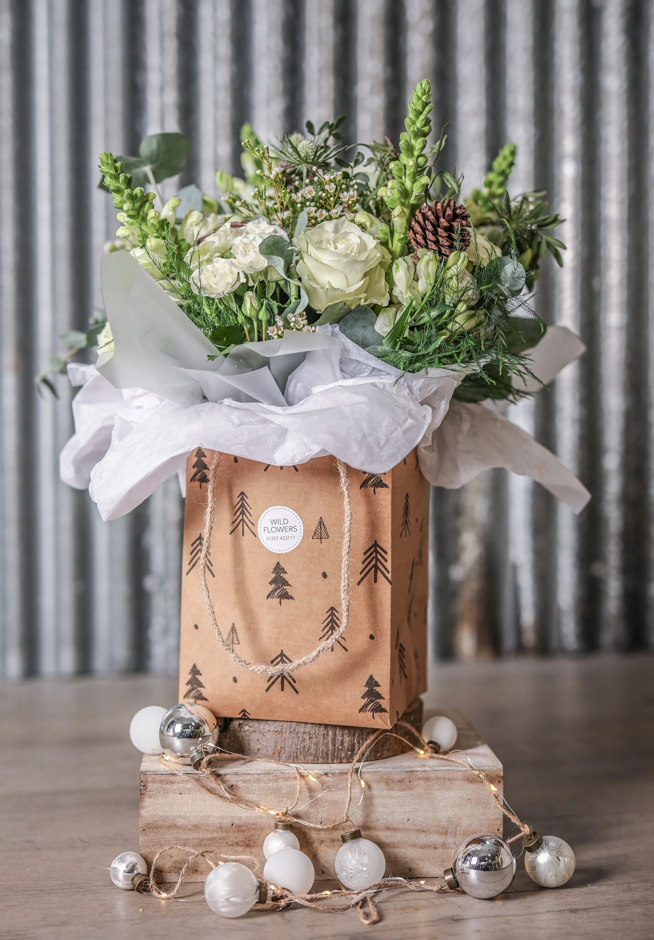 Christmas Flowers in a natural gift bag